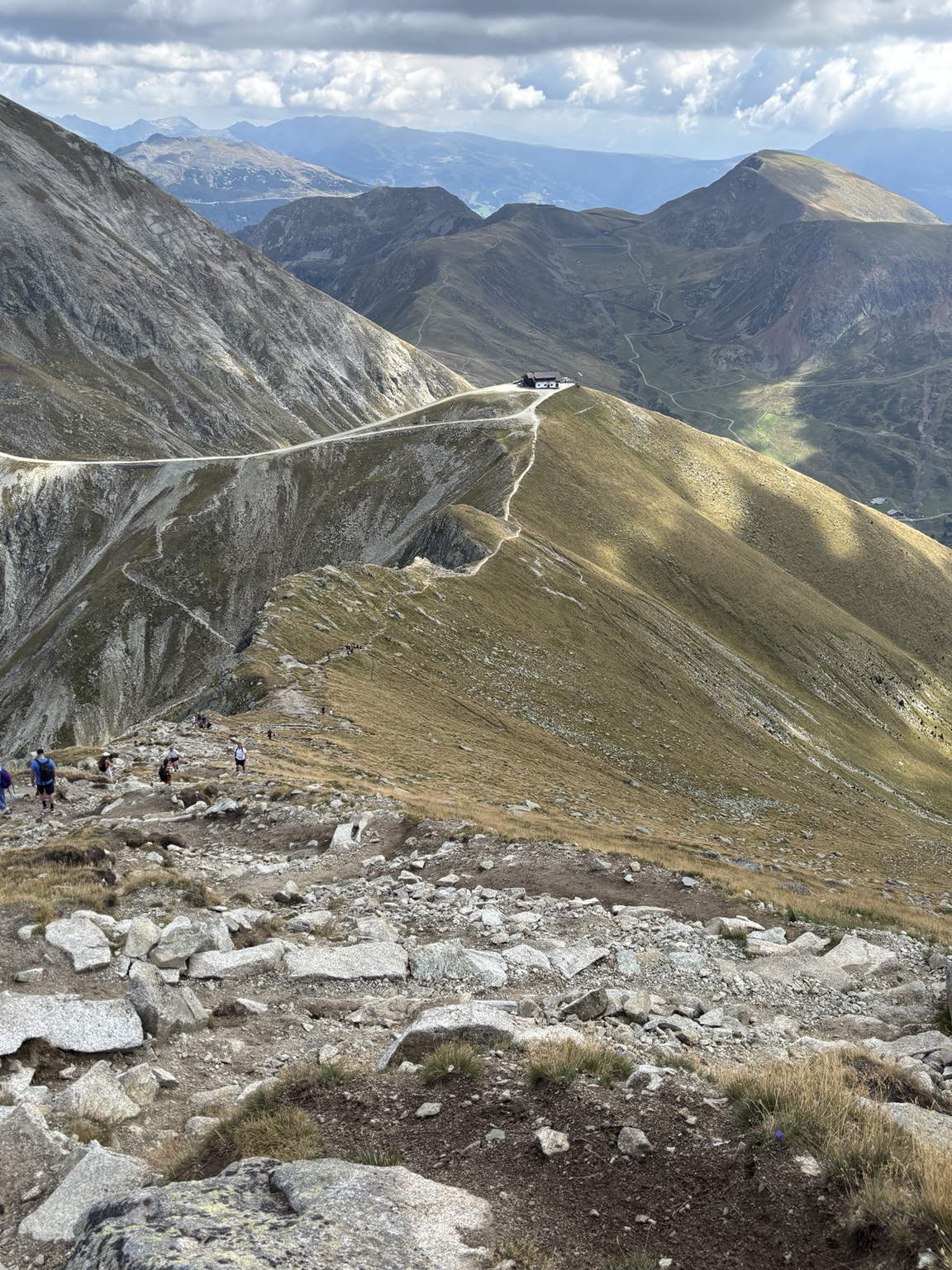 A steep hiking trail climbing through the Dolomites